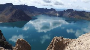 A mountain top volcano lake -- IE a Caldera